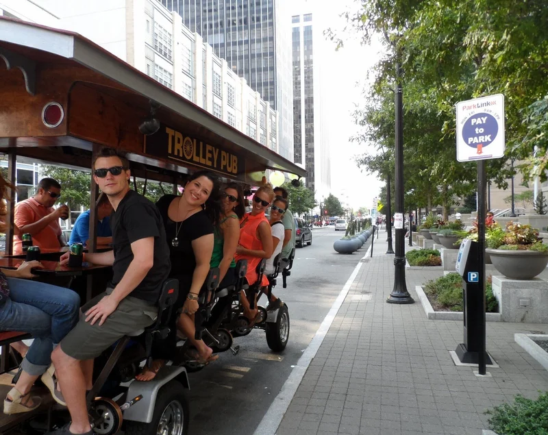 Guests riding the Trolley Pub